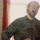 Male Guitarist Singing Song at Home - VideoHive Item for Sale