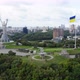 Aerial Top View of Kiev Motherland Statue Monument and National Ukrainian Flag in Kyiv Ukraine - VideoHive Item for Sale