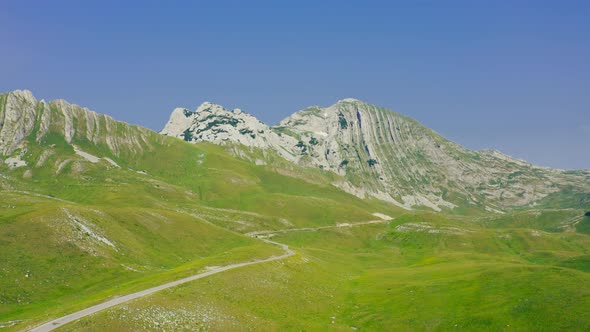 Aerial Drone View of Prutash Mountain with Road on National Park Durmitor in Montenegro