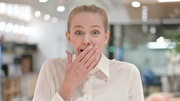 Portrait of Young Businesswoman Feeling Surprised Expression