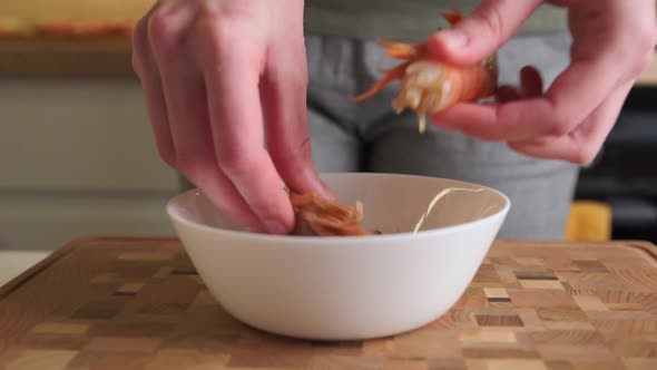 Woman Cleaning Shrimps for Cooking