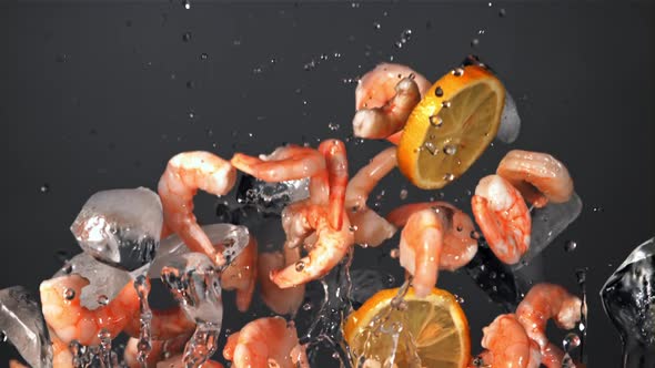 Shrimp with Pieces of Lemon and Ice Fly Up and Fall Down