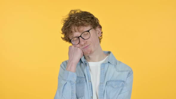 Sleeping Redhead Young Man Taking Nap, Yellow Background