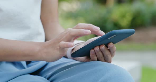 Woman use of mobile phone