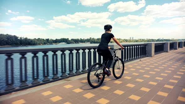 Bike Fitness Workout. Adorable Girl Cyclist Workout. Vacation Holiday Fun Cyclist Sport Recreation.