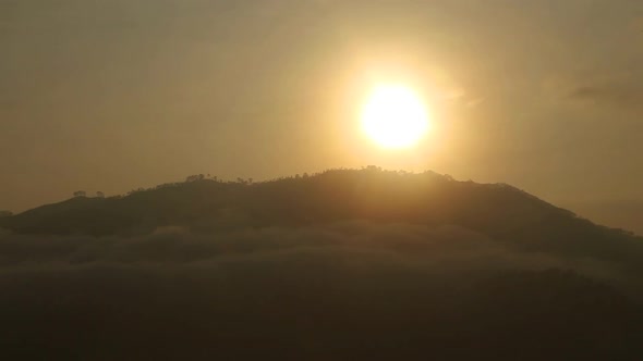 View of foggy sunrise on the Little Adam's Peak in Ella, Sri Lanka