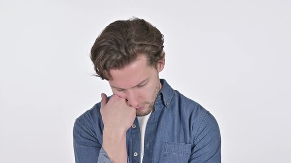 Portrait of Young Man Taking Nap on White Background