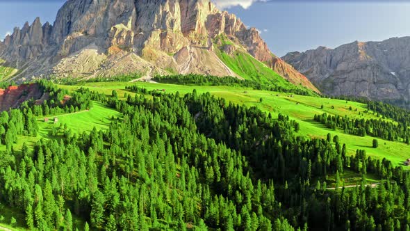 Aerial view of Passo delle Erbe and green hills, Dolomites