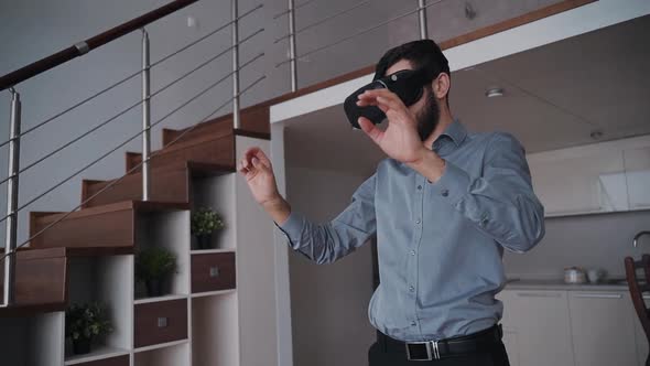 Man Is Standing and Using Smart Digital Vr Technology Gadget By Gesture Interaction Motion.