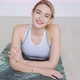 Delighted Sportswoman Lying on Mat in Studio - VideoHive Item for Sale