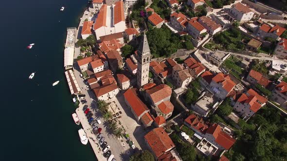 Aerial View of the Rooftops of Perast Houses and the Tower of the Church of St
