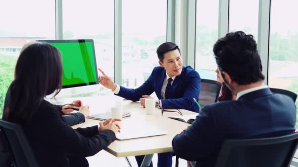 Business People in the Conference Room with Green Screen