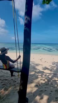 Anse Source d'Argent La Digue Seychelles Young Asian Woman on a Tropical Beach During a Luxury