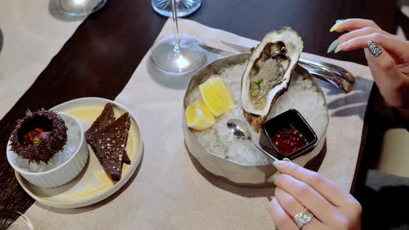 Oysters on a Gray Plate