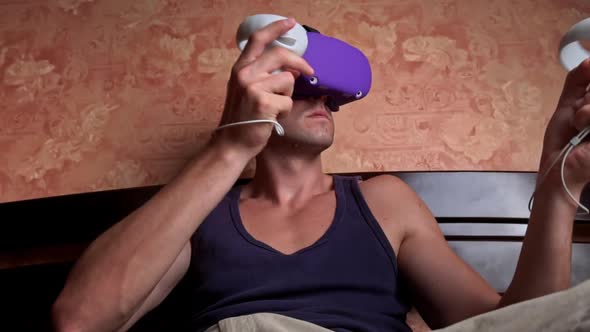 Man in a Virtual Reality Helmet Controls the Controllers
