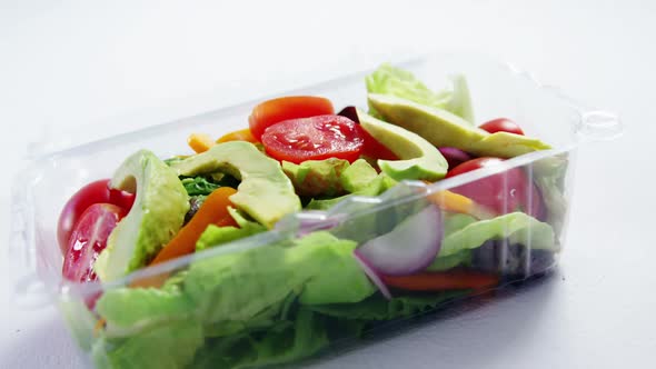 Fresh vegetables in plastic container