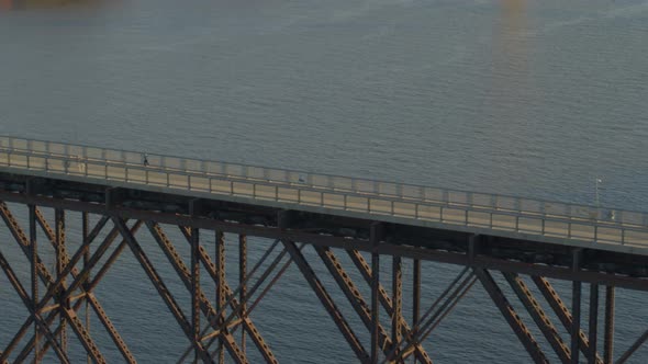 Aerial of walkway over Hudson river and settlement at a distance