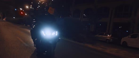 Motorbike driving at Night in the City