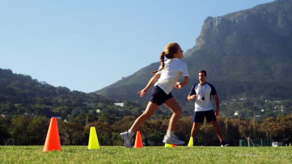 Children running in park during race