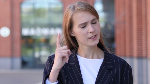 Angry Yelling Business Woman Reacting to Problem at Work