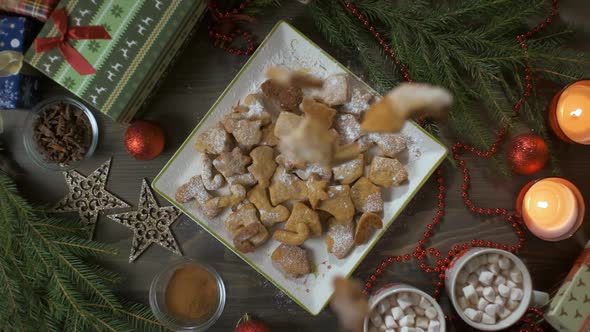 Christmas Cookies Fall on the Table in Slow Mo. Christmas Time.