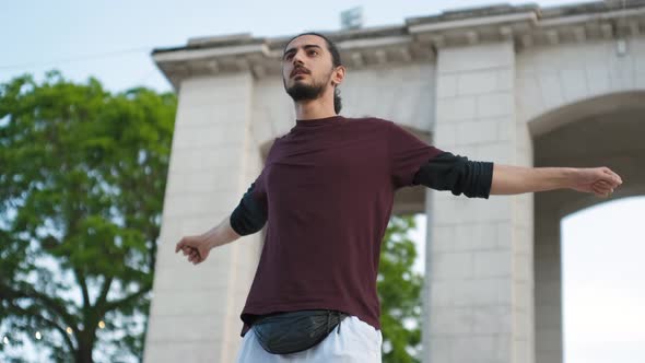 Young Attractive Arab Man Doing Stretching After Workout