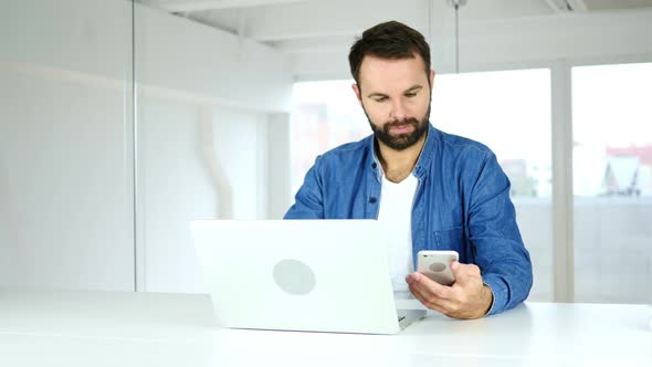 Man Using Smartphone Typing Email Messaging