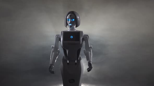 Robot Dances in a Dark Room. Black Smoke Background