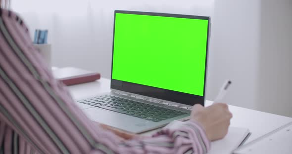 Greenscreen Laptop And Girl Working