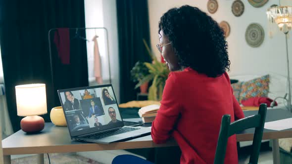 Conference Call Held By an African-american Lady in Self-quarantine