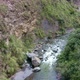 Mountain stream high up in the Andes with little vegetation alongside the river - VideoHive Item for Sale