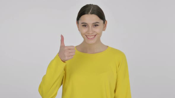 Spanish Woman showing Thumbs Up on White Background