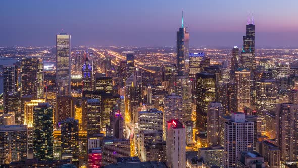 Beautiful Chicago Skyline Skyscrapers Day to Night Aerial Sunset