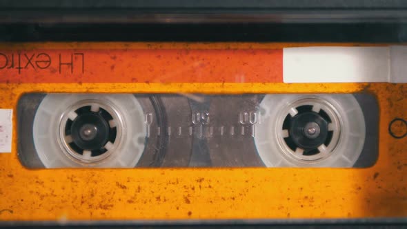 Audio Tape. Vintage Tape Recorder Plays Audio Cassette Inserted Therein