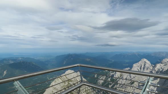 Panorama from Zugspitze mountain peak over Apls, moving forward shot