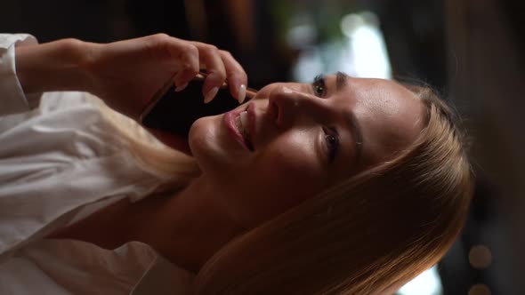 Closeup Vertical Shot of Face Happy Charming Blonde Female Having Conversation on Mobile Phone
