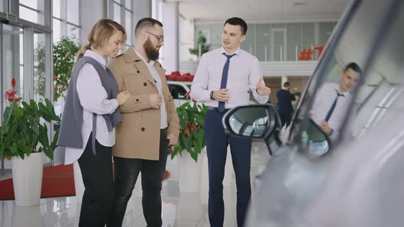 Sales Manager in a Car Dealership Serves a Married Couple