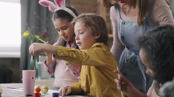 Children Making Easter Decorations in Arts and Crafts Class