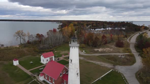 4K drone video Tawas Point Lighthouse in Tawas, Michigan during the fall.