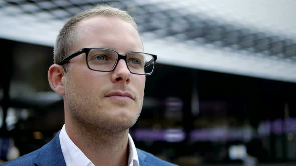 Lifestyle Portrait of Young Handsome Successful Business Man Thinking About Future Career