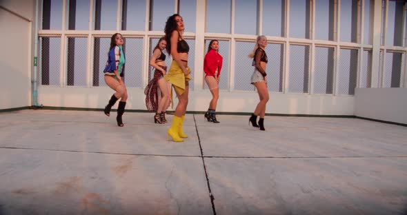 All Girl Dance Crew Performing Routine On Rooftop