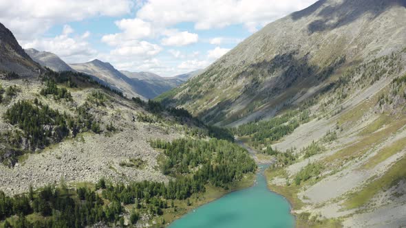 Top View of a Mountain Valley and a Stream