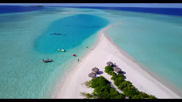 Aerial top view abstract of tranquil resort beach time by clear lagoon and white sandy background of