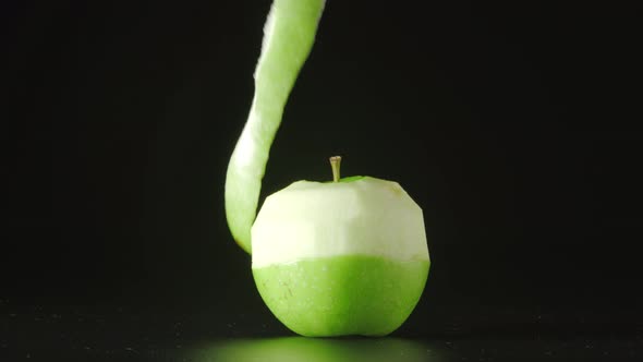 Hand Cleans A Green Apple (Spiral)