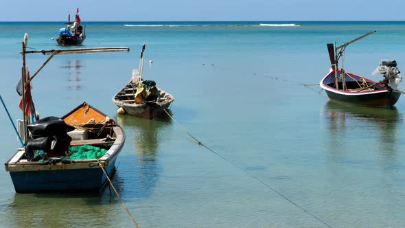 Longtail Fisher Boats on Beach