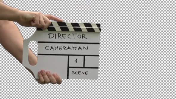 Hands With Movie Production Clapper Board With Alpha