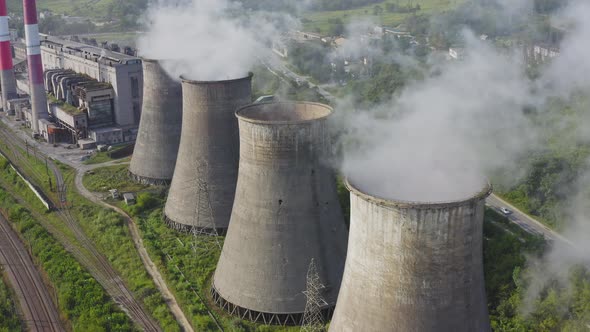 Aerial View of the Pipes of a Coal Power Plant and Cooling Tower