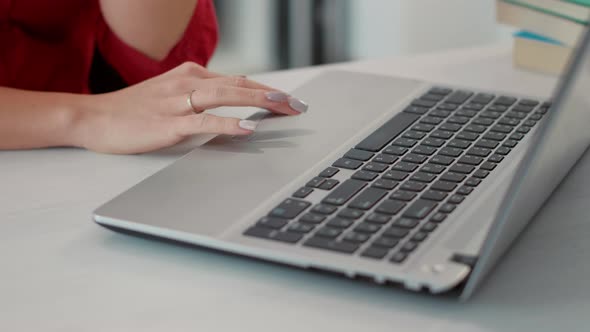 Office Worker Using Laptop to Plan Financial Development