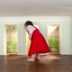 Toddler girl picking up a key in a tiny room - VideoHive Item for Sale
