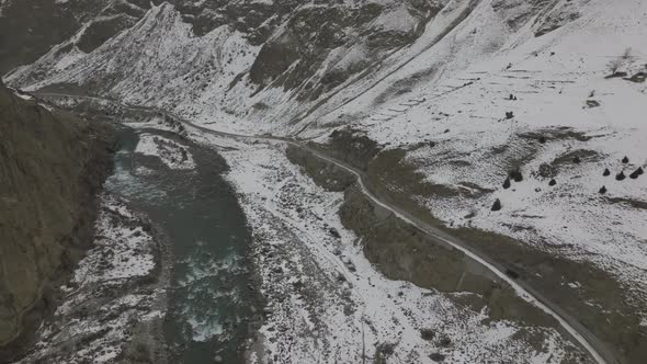 Aerial View Of Karakoram Highway Near Khunjerab Pass, Hunza Valley, Pakistan - drone shot. Aerial Fl